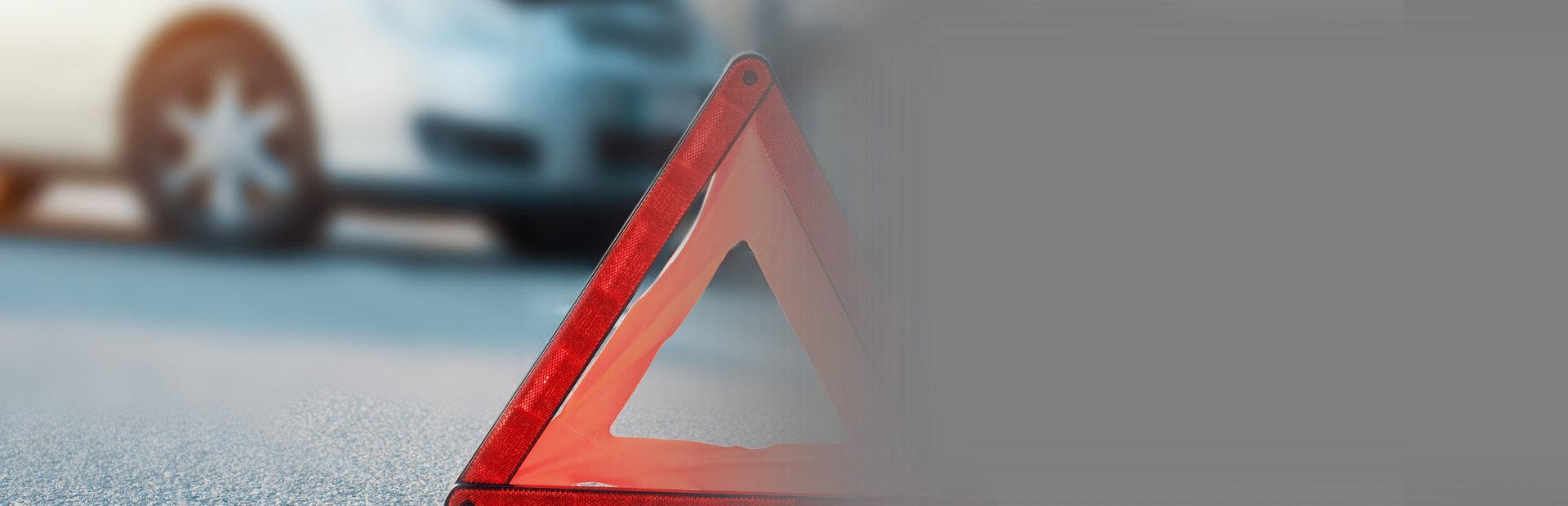 trójkąt ostrzegawczy na drodze - Slajd 1